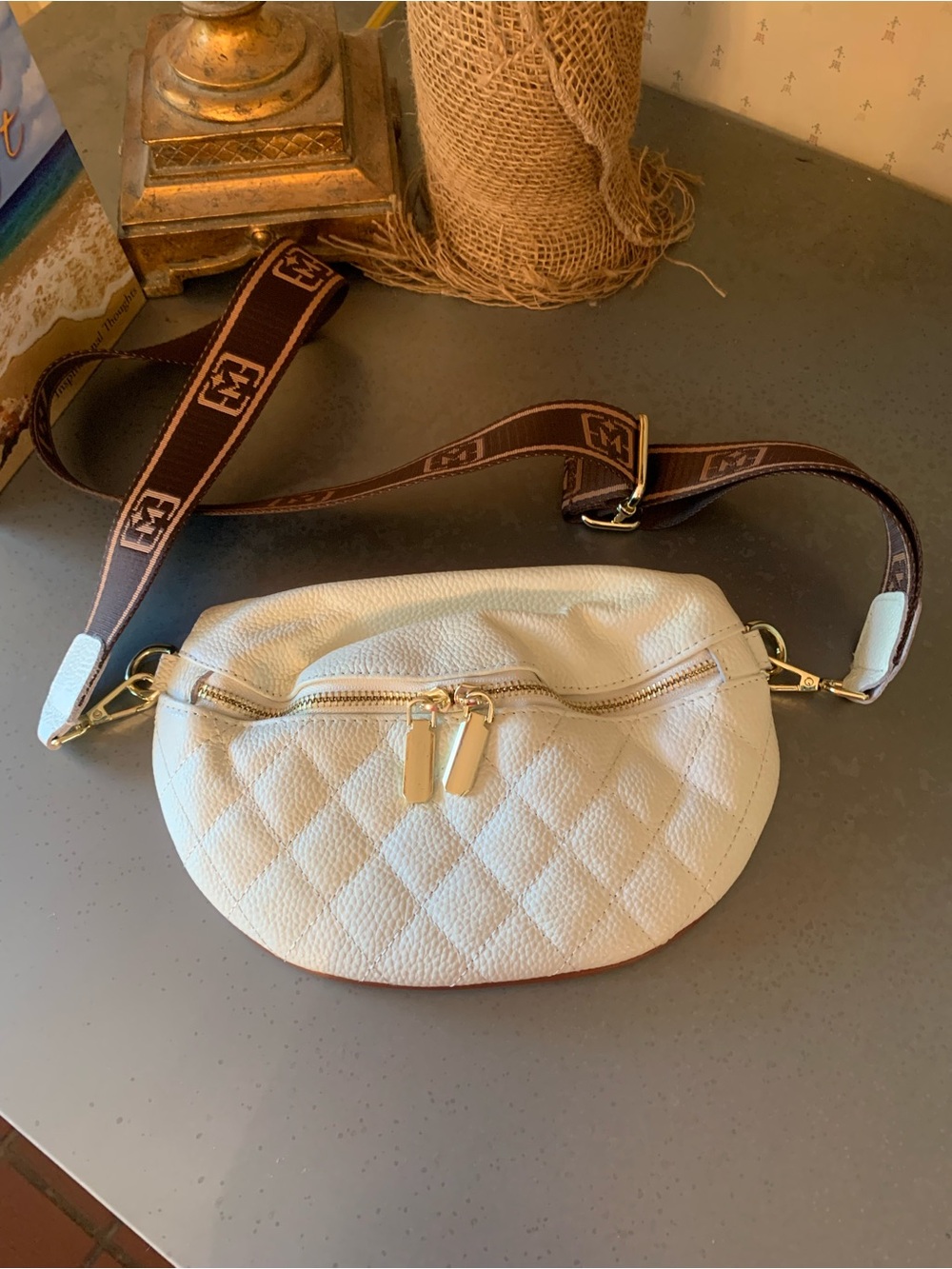 Eslcorri small Fanny pack or crossbody, NEW carried 1 time. Crescent shaped.